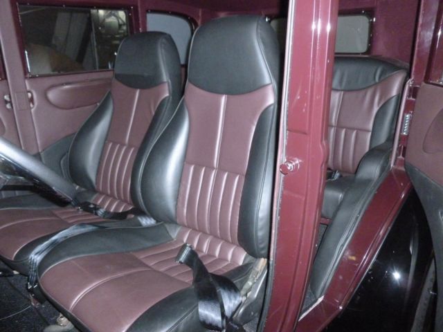 1930 maroon and black Ford Model A four door