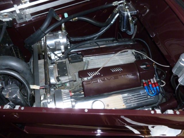 1930 maroon and black Ford Model A four door