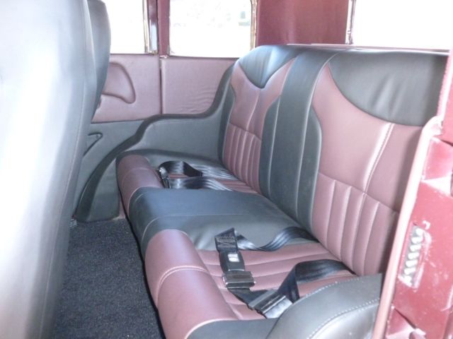 1930 maroon and black Ford Model A four door