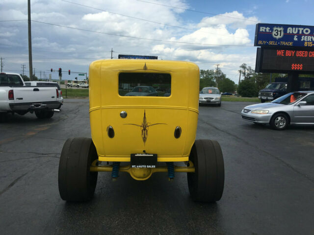 1930 Yellow Ford Model A Sedan