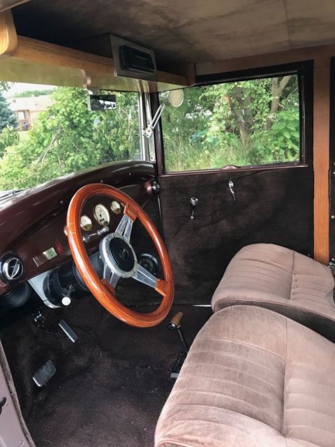 1930 brown metallic/tan metallic Ford Model A Sedan