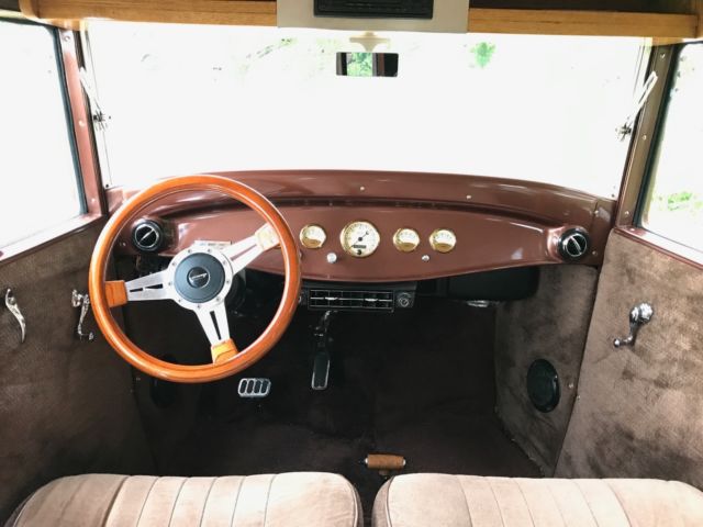 1930 brown metallic/tan metallic Ford Model A Sedan