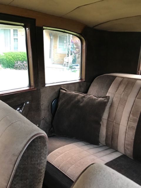 1930 brown metallic/tan metallic Ford Model A Sedan