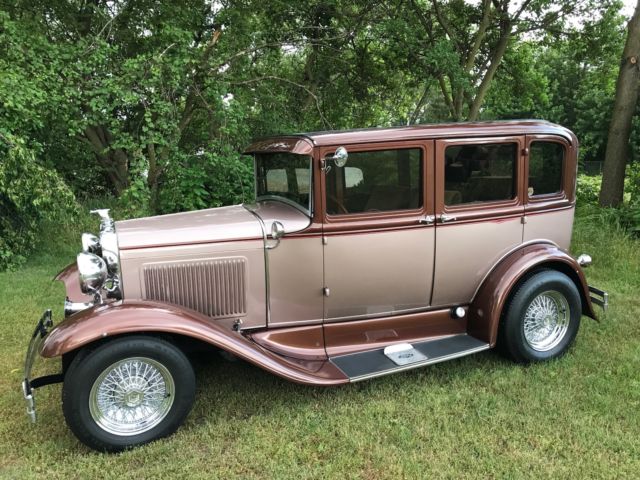 1930 brown metallic/tan metallic Ford Model A Sedan