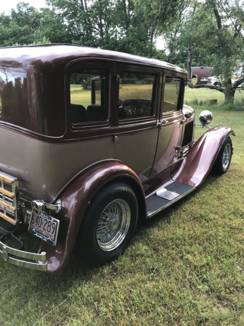 1930 brown metallic/tan metallic Ford Model A Sedan