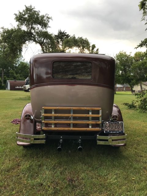 1930 brown metallic/tan metallic Ford Model A Sedan