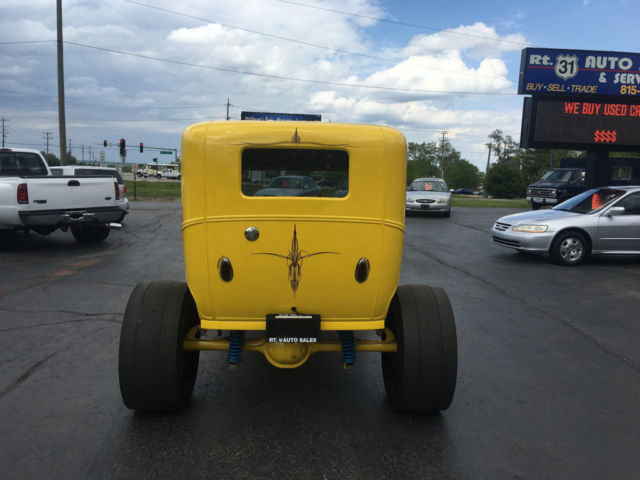 1930 Yellow Ford Model A Sedan