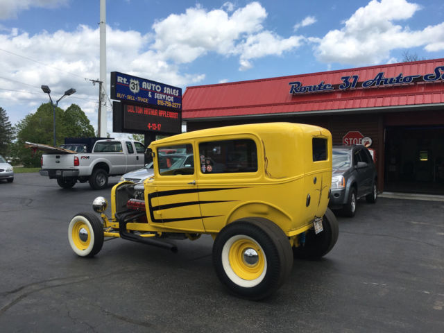 1930 Yellow Ford Model A Sedan