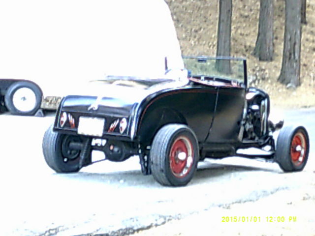 1930 flat black Ford Model A 2 door
