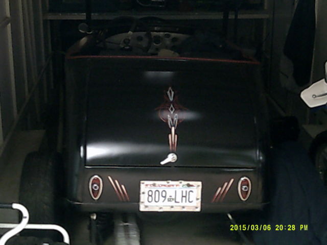 1930 flat black Ford Model A 2 door