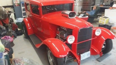 19300000 red Ford Model A tudor
