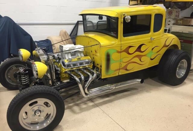 1931 Yellow Ford Model A 5 window coupe