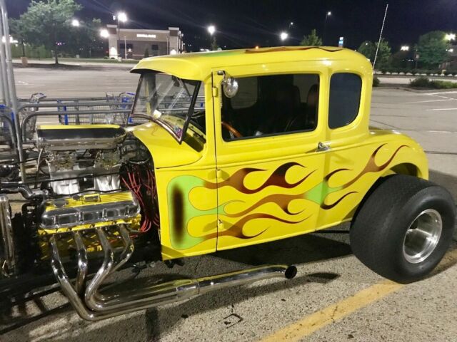 1931 Yellow Ford Model A 5 window coupe