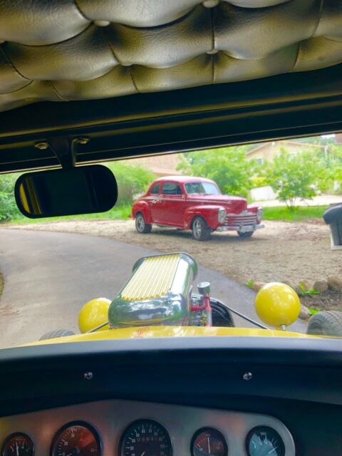 1931 Yellow Ford Model A 5 window coupe