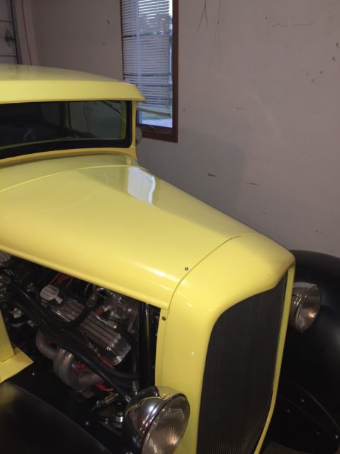 1931 Yellow Ford Model A Coupe