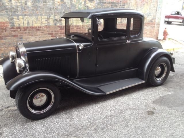1931 Yellow Ford Model A Coupe