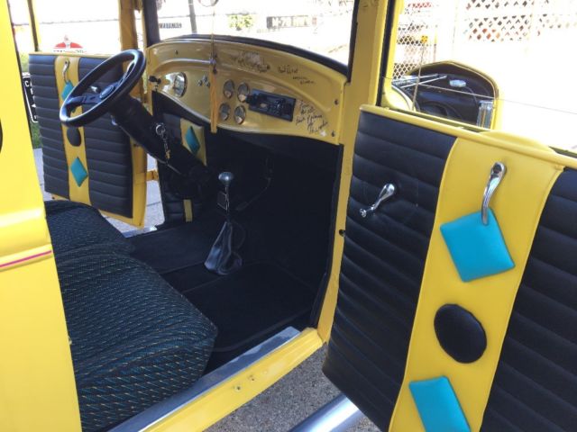 1931 Yellow Ford Model A Coupe