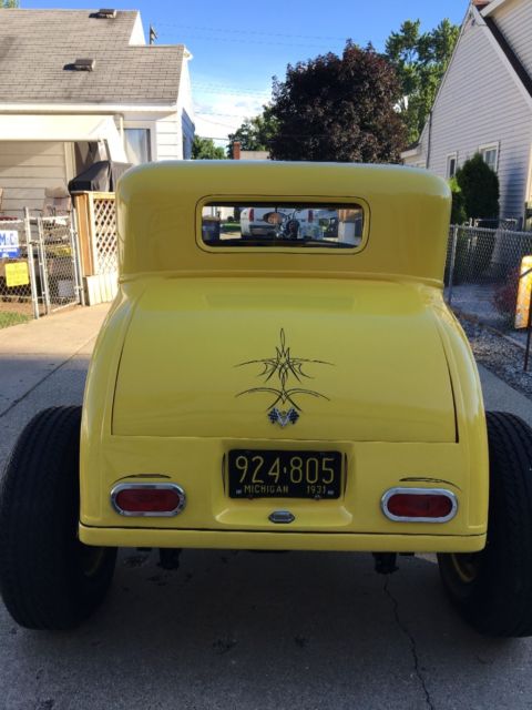 1931 Yellow Ford Model A Coupe