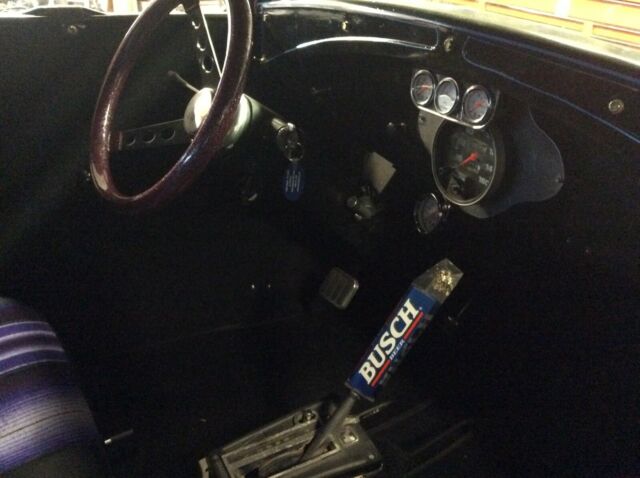 1931 Purple Ford Model A 5 window coupe