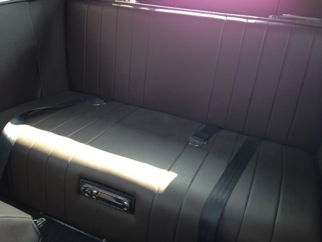 1931 Grey, black and rust Ford Model A Sedan