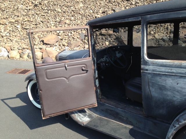 1931 Grey, black and rust Ford Model A Sedan