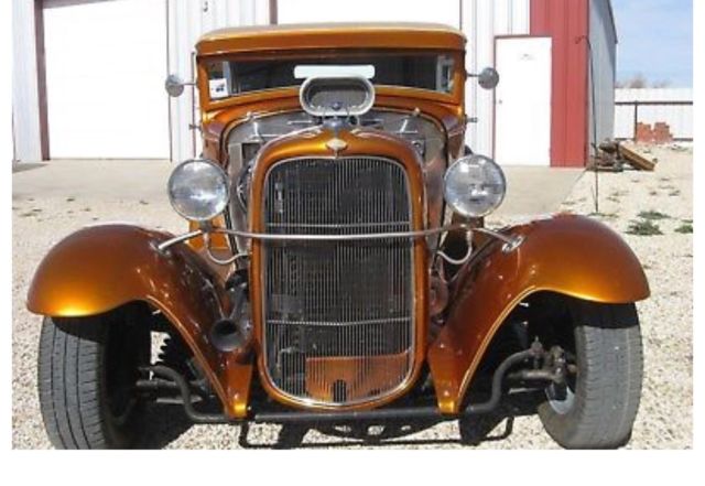 1931 Orange Ford Tutor Coupe Coupe
