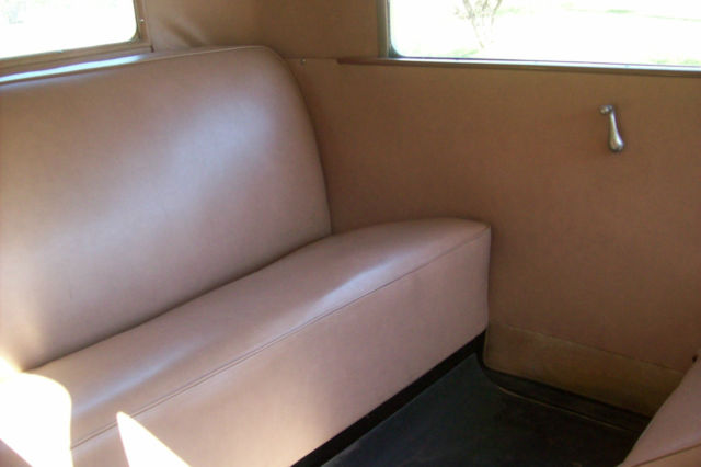 1931 ginger ale/black Ford Model A Sedan