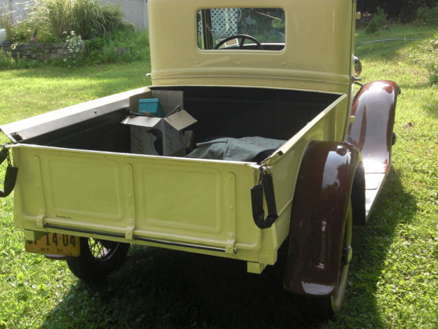 1931 dark brown fenders, tan body Ford Model A widebed pickup
