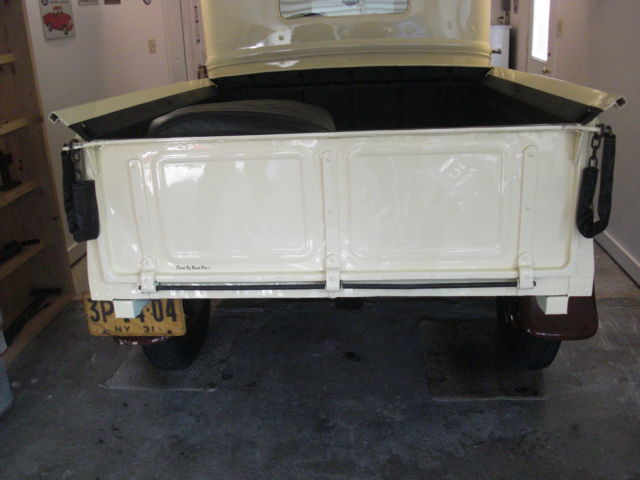 1931 dark brown fenders, tan body Ford Model A widebed pickup