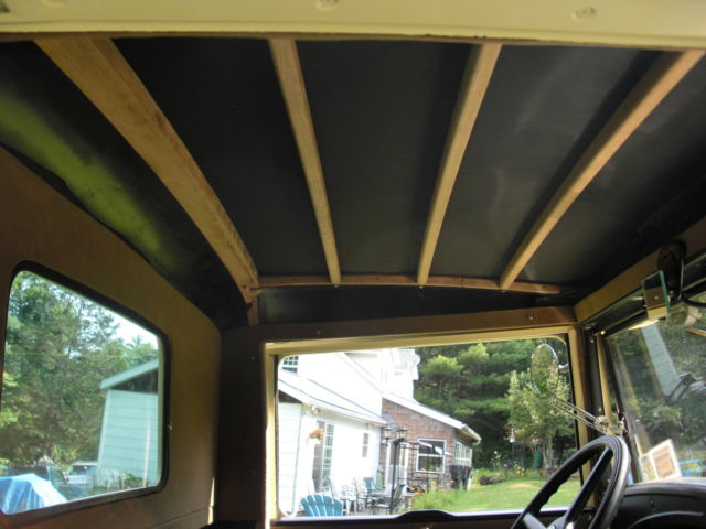 1931 dark brown fenders, tan body Ford Model A widebed pickup