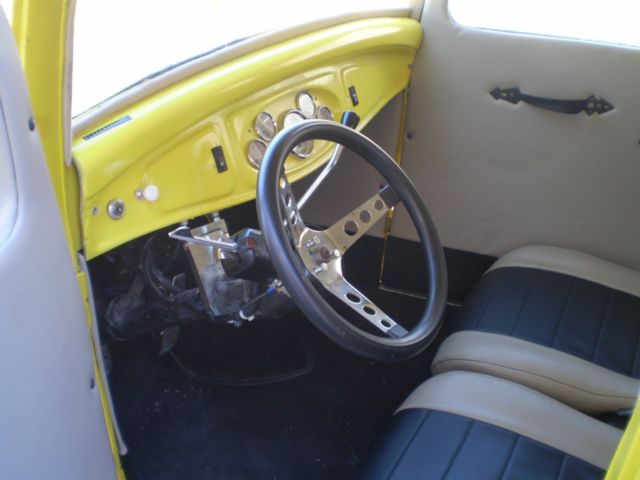 1932 Yellow Ford Model A Coupe