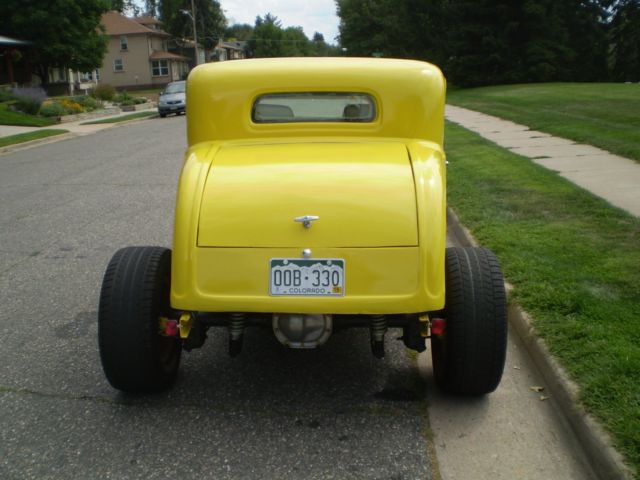 1932 Yellow Ford Model A Coupe