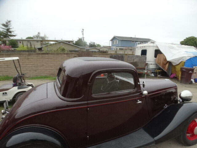 1933 maroon Ford 3 w coupe Coupe