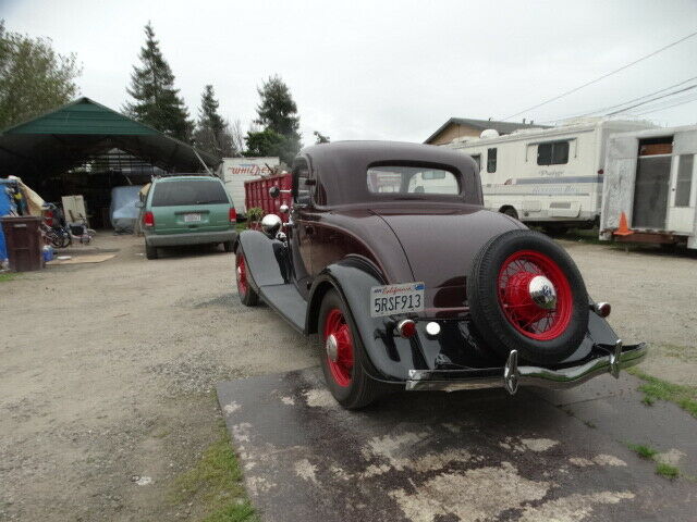 1933 maroon Ford 3 w coupe Coupe