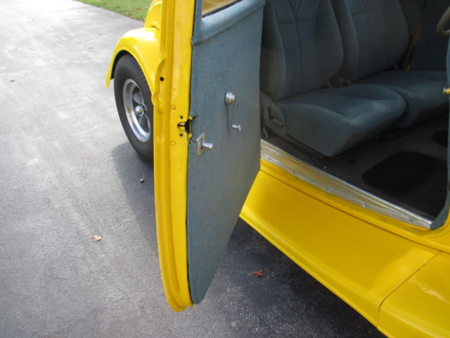 1933 Yellow Ford 5 WIMDOW COUPE