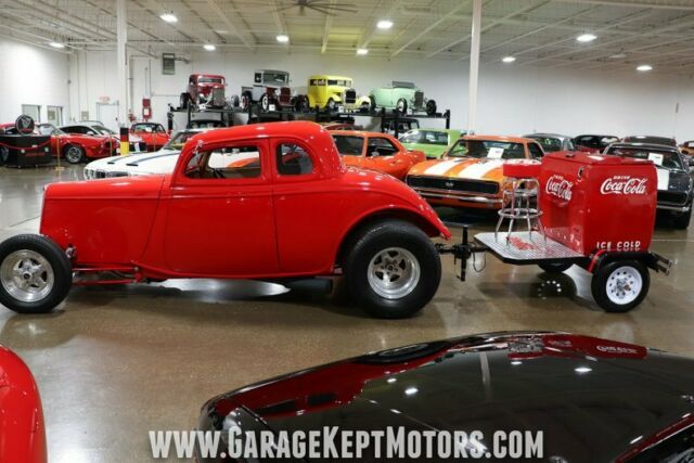 1934 Red Ford 5-Window Coupe