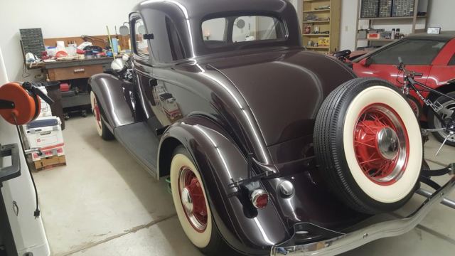 1934 dark maroon Ford 3 window coupe Coupe