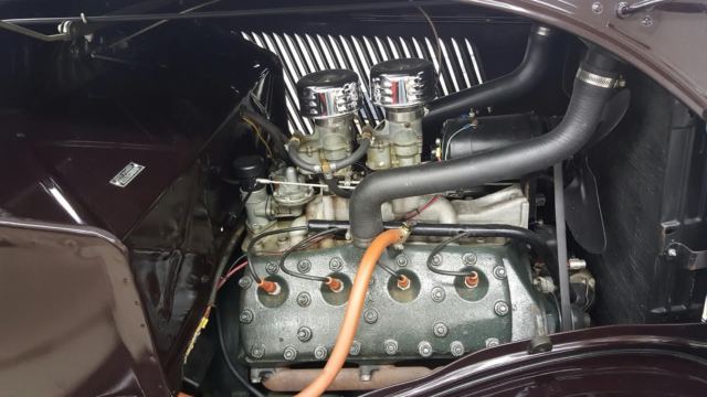 1934 dark maroon Ford 3 window coupe Coupe