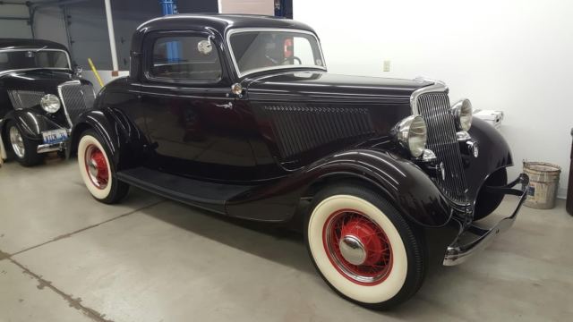 1934 maroon Ford three window coupe Coupe