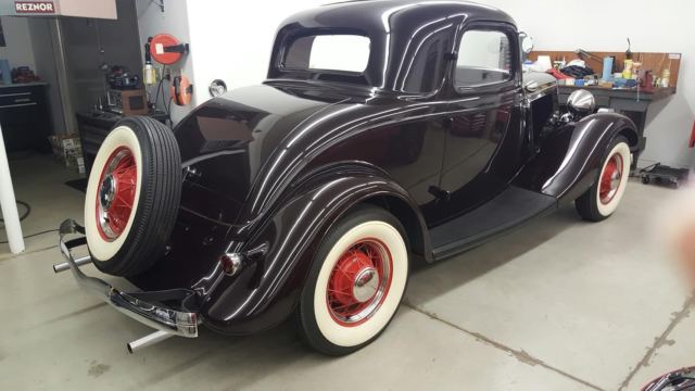 1934 maroon Ford three window coupe Coupe