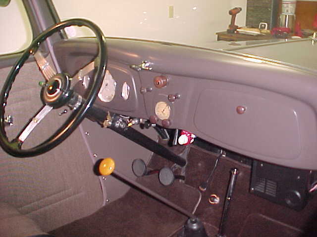 1934 maroon Ford three window coupe Coupe