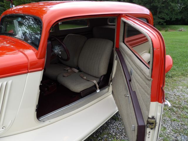 1934 Orange & Beige Ford Model A Sedan