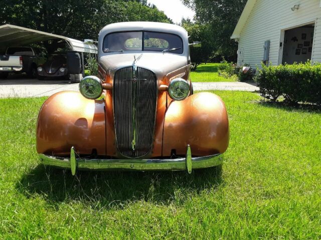 1936 Orange Chevrolet Master deluxe sport coupe Coupe