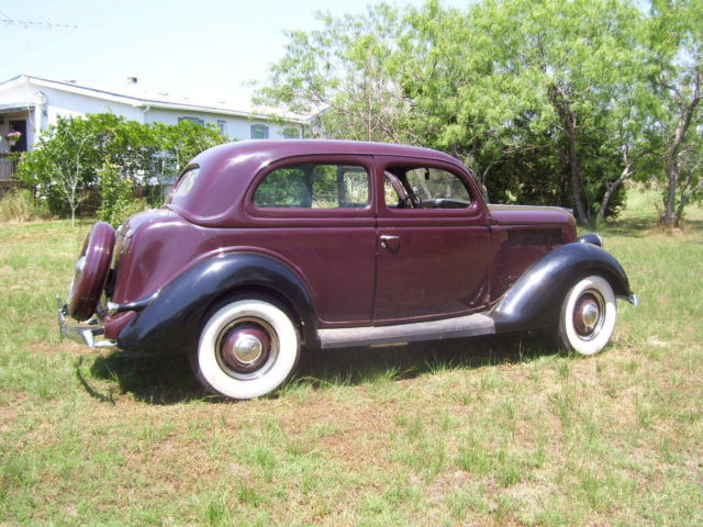 1936 red black Ford sedan two door sedan