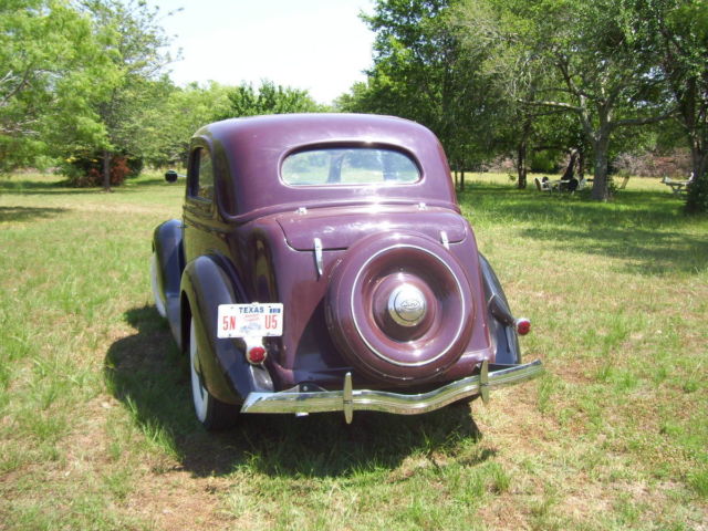 1936 red black Ford sedan two door sedan