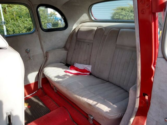 1936 Red Ford V 8 4 door sedan