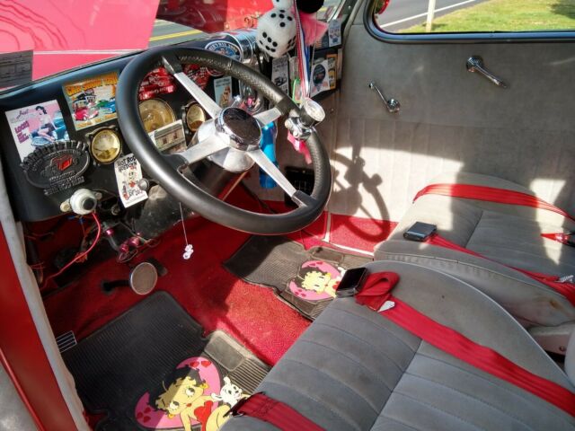 1936 Red Ford V 8 4 door sedan