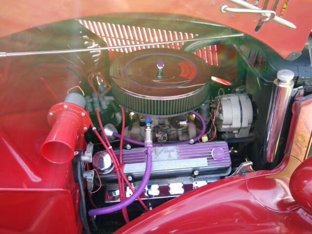 1936 Red Ford V 8 4 door sedan