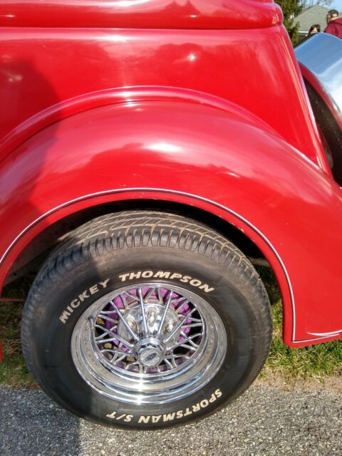 1936 Red Ford V 8 4 door sedan