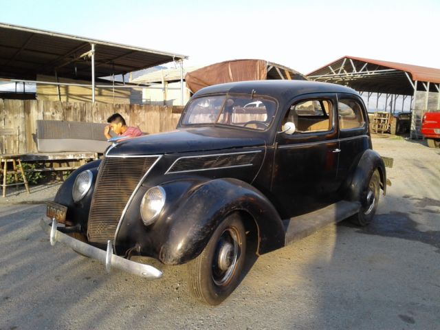 1937 black Ford 2 dr.